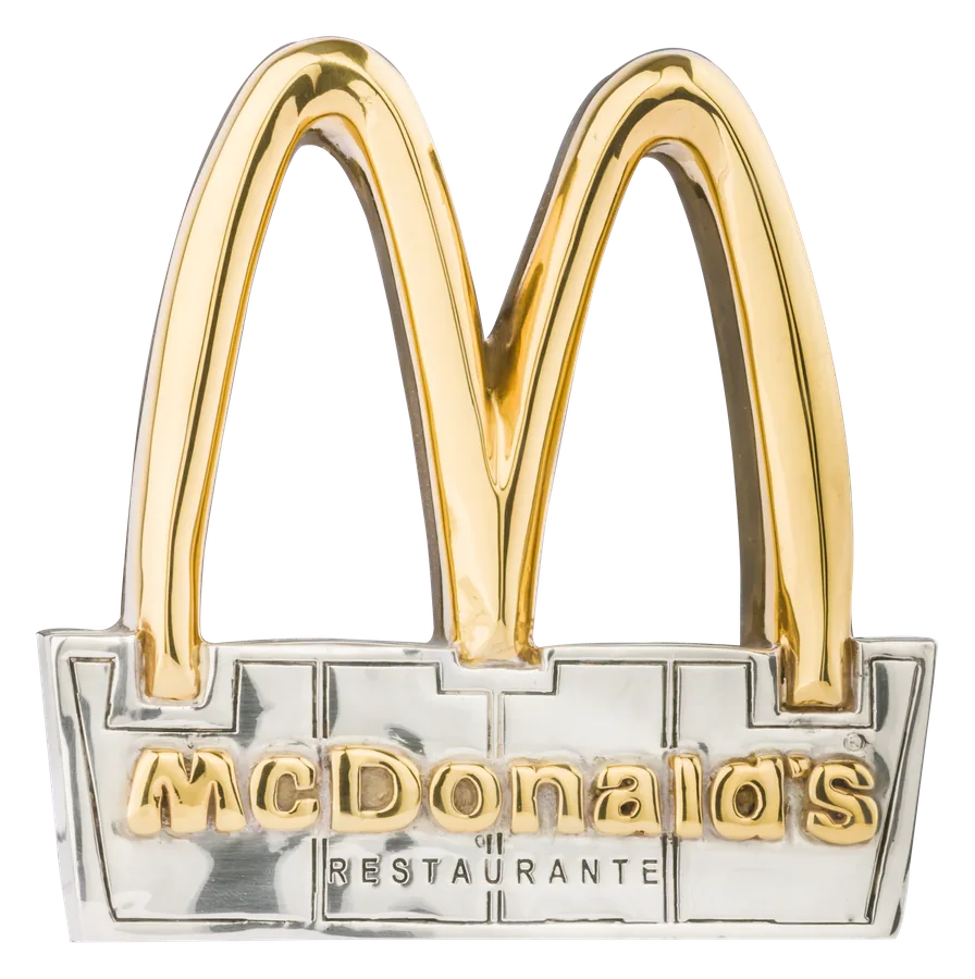 McDonald’s golden arches in 24-karat gold above a silver McDonald’s sign